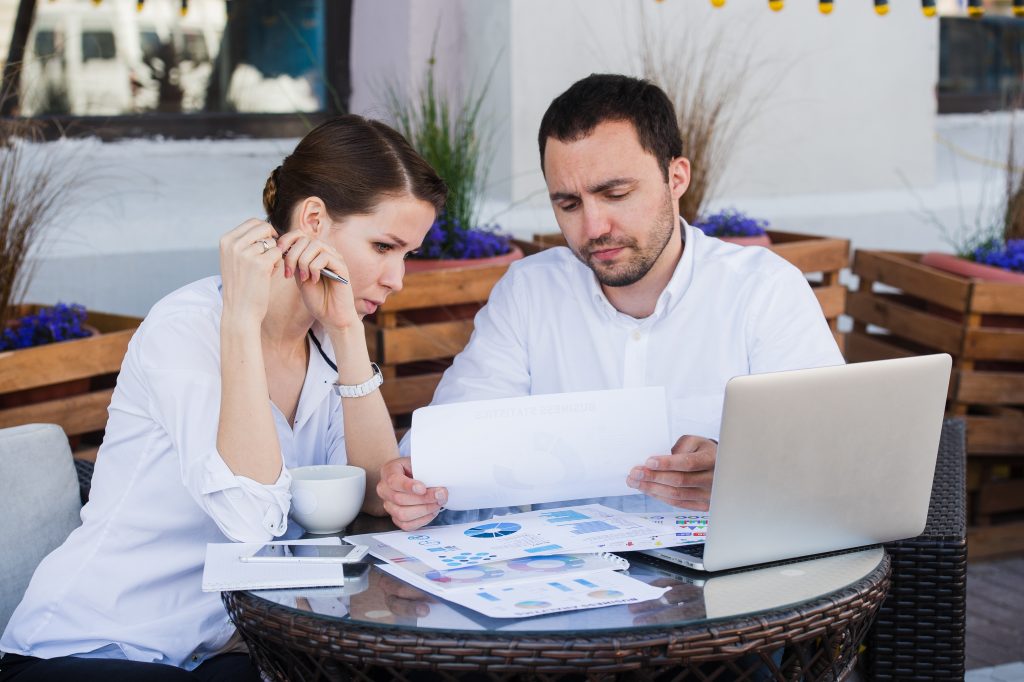 two business people working out conflict