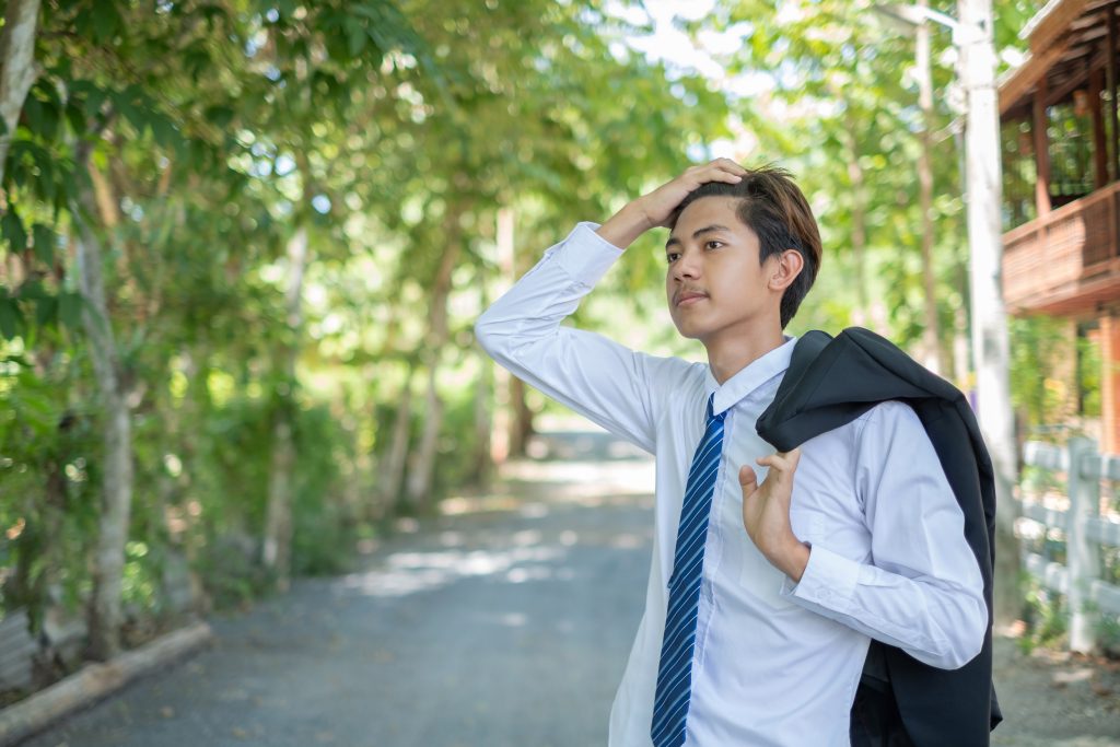 young man who is showing stress